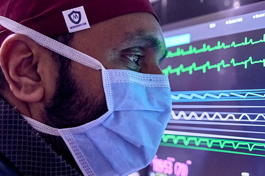 Closeup of Renji reviewing a monitor